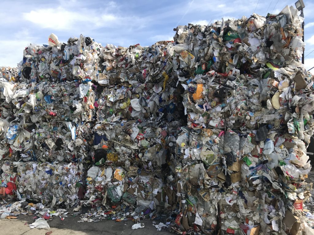 Bales of materials waiting to be sorted. 